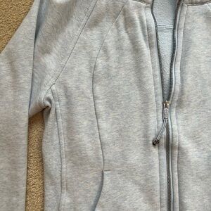 Lulu light blue zip up hooded sweatshirt.  Great condition.